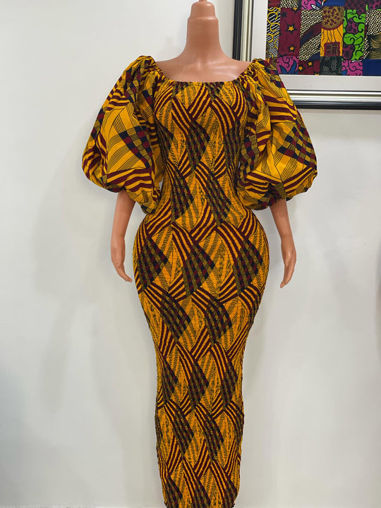 African print stretchy body-con dress with puffy sleeves.