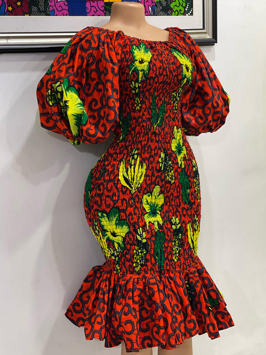 African print smoke body-con dress with puffy sleeves.