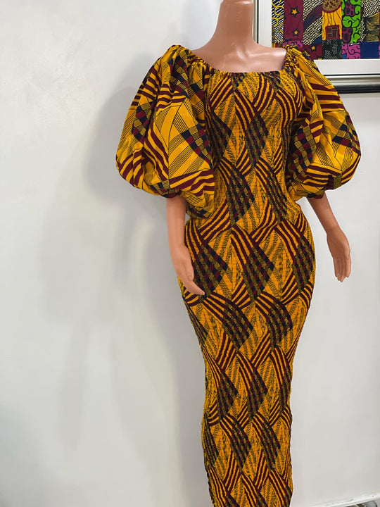 African print stretchy body-con dress with puffy sleeves.