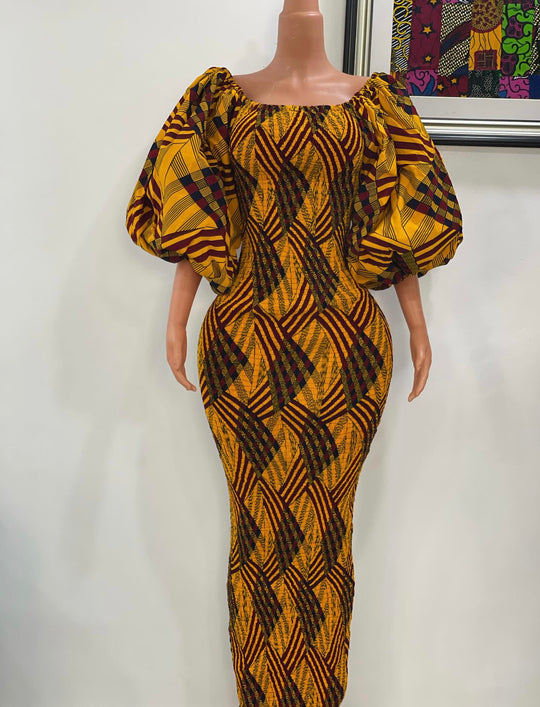 African print stretchy body-con dress with puffy sleeves.