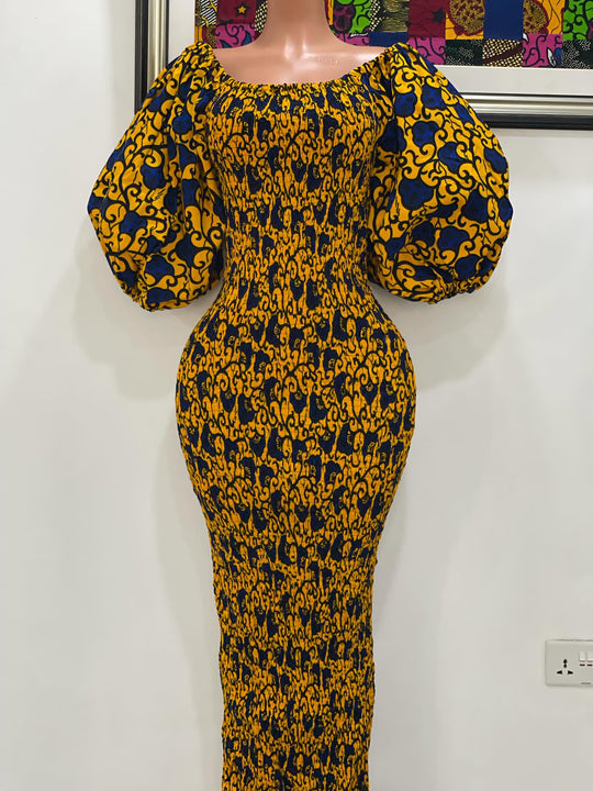 African print stretchy body-con dress with puffy sleeves.