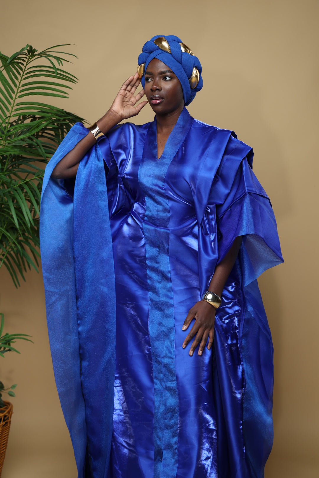 Liquid satin rich auntie Bubu/kaftan gowns.