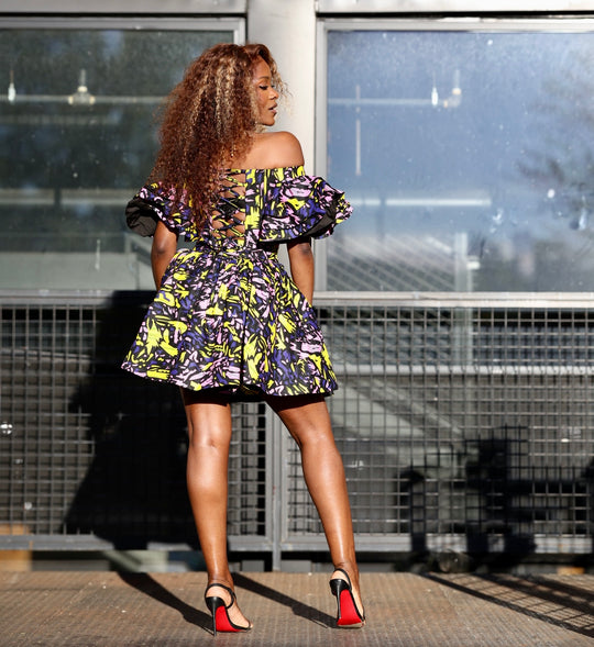 Short African Print Short Peplum Skirt With Dramatic Sleeves Corset Top.