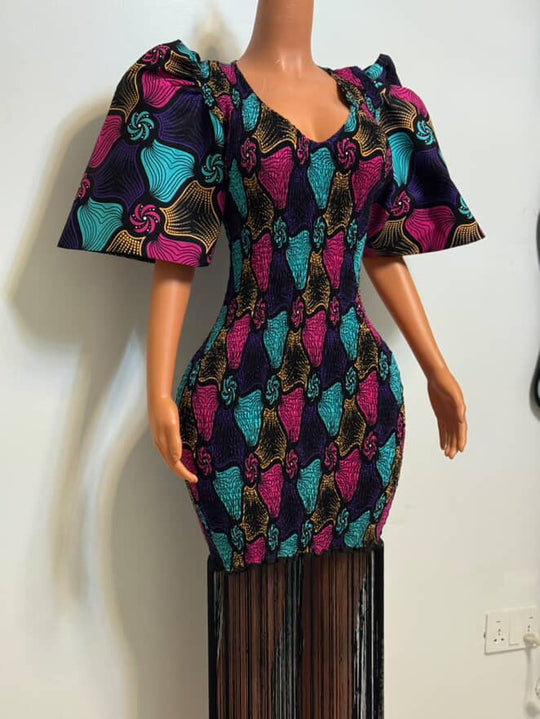 African print stretchy bodycon dress with dripping fringe.
