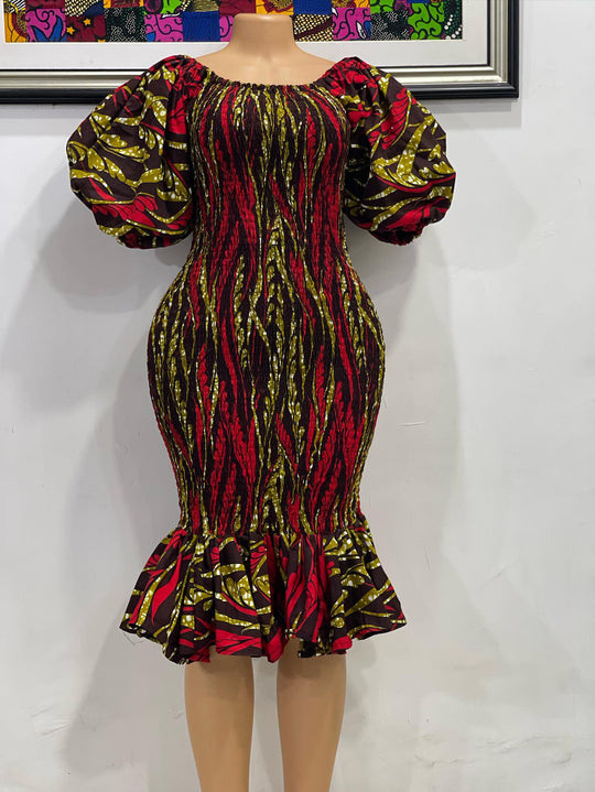 Short African print smoke dress with puff sleeves.