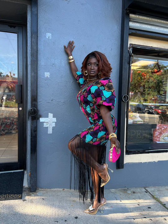 African print stretchy bodycon dress with dripping fringe.