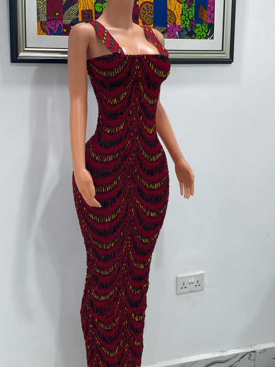 African print smokes spaghetti sleeve body-con dress.