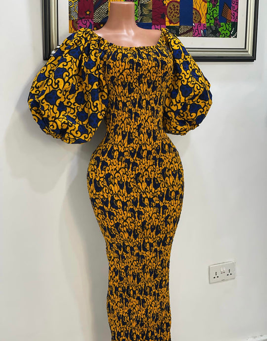 African print stretchy body-con dress with puffy sleeves.