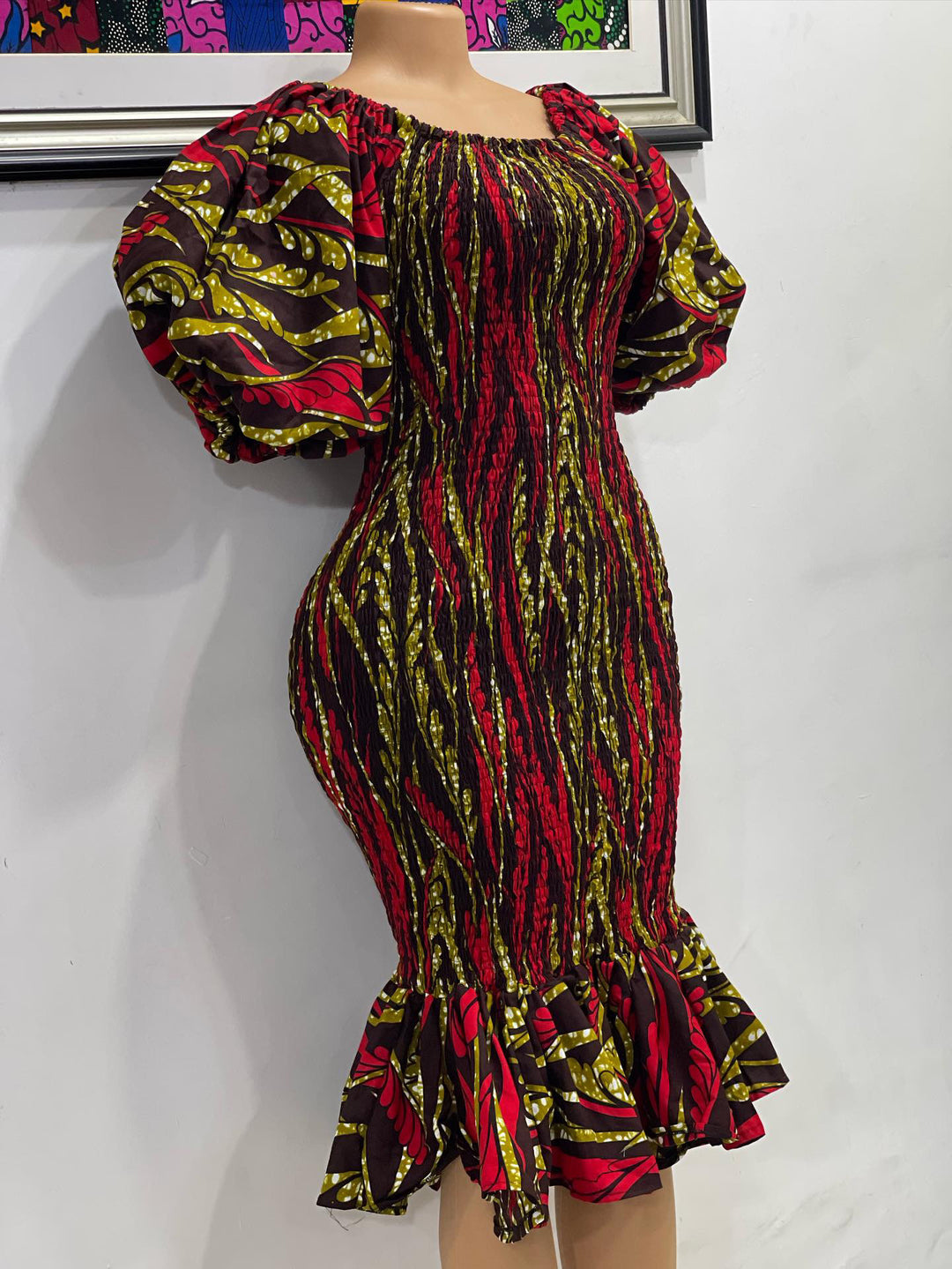 Short African print smoke dress with puff sleeves.