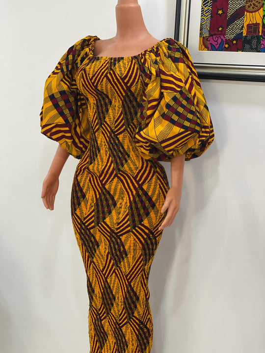 African print stretchy body-con dress with puffy sleeves.