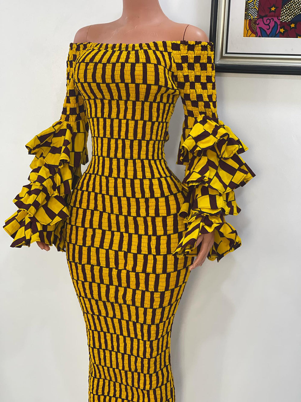 African print smoked bodycon dress with ruffles sleeves.