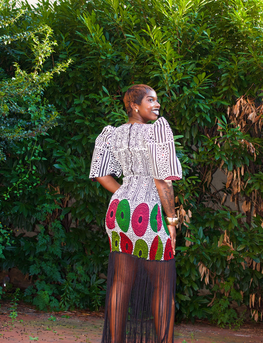 African print smoked bodycon dress with dripping fringe.