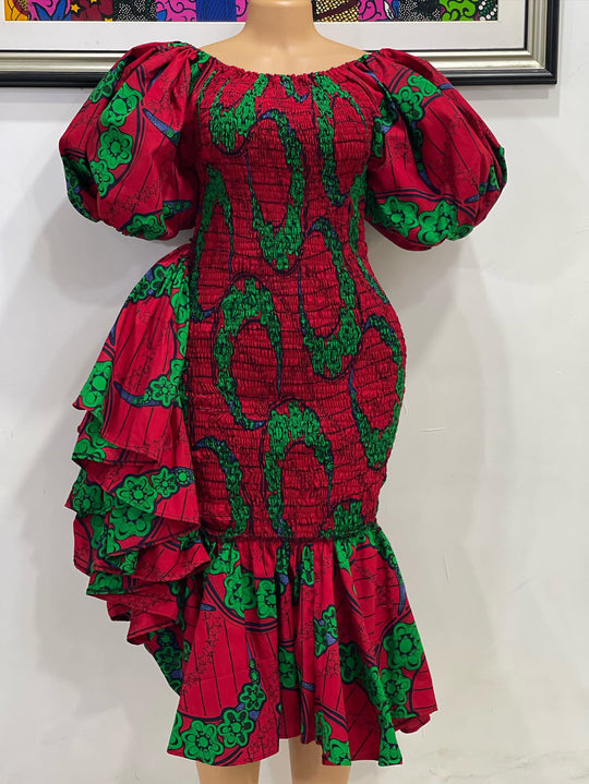 African print smoked body dress with ruffles on the side.