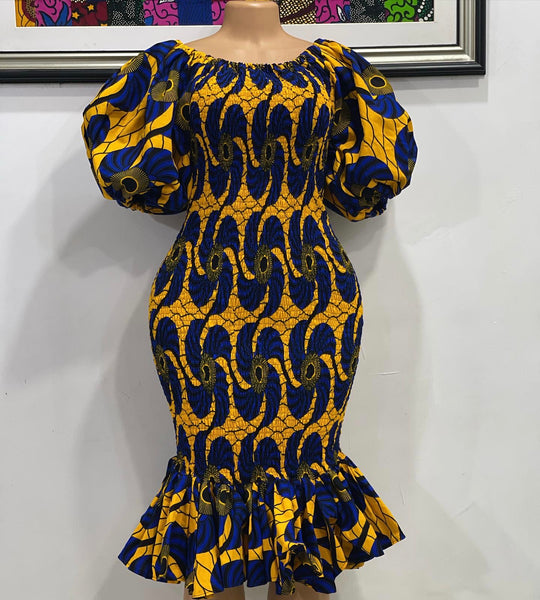 African print smoke body-con dress with puffy sleeves.