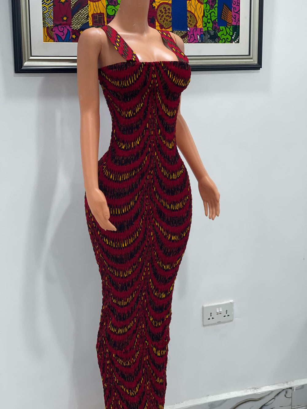 African print smokes spaghetti sleeve body-con dress.