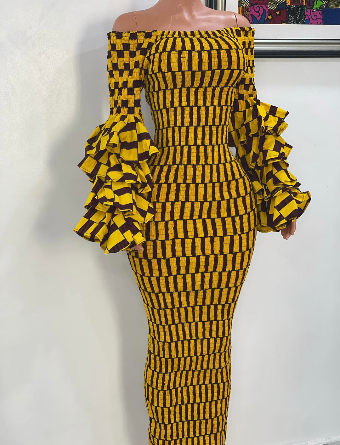 African print smoked bodycon dress with ruffles sleeves.