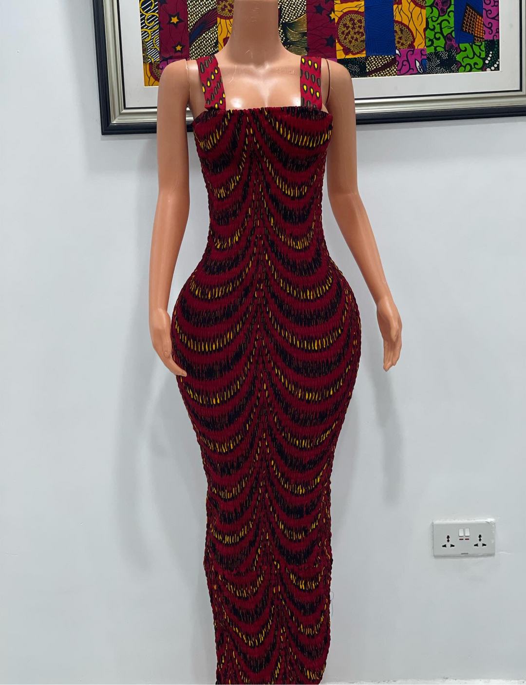 African print smokes spaghetti sleeve body-con dress.