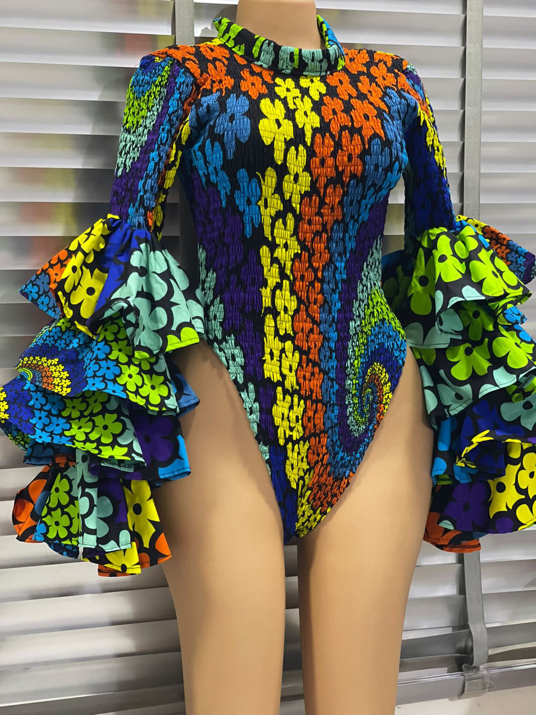 African print stretchy bodysuit.💥