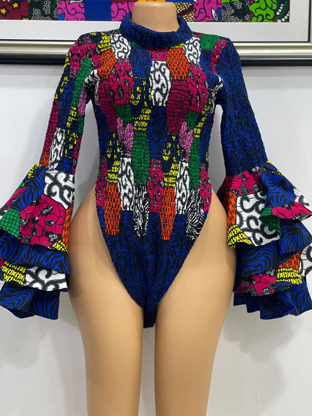 African print stretchy bodysuit.💥