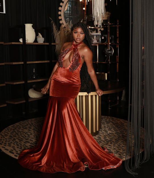 Burn orange velvet prom dress.