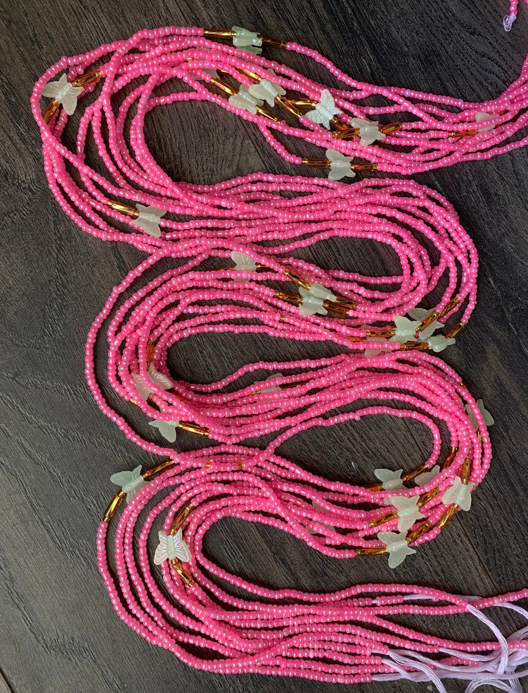 Pink and gold waist beads with glow and the dark butterfly 🦋