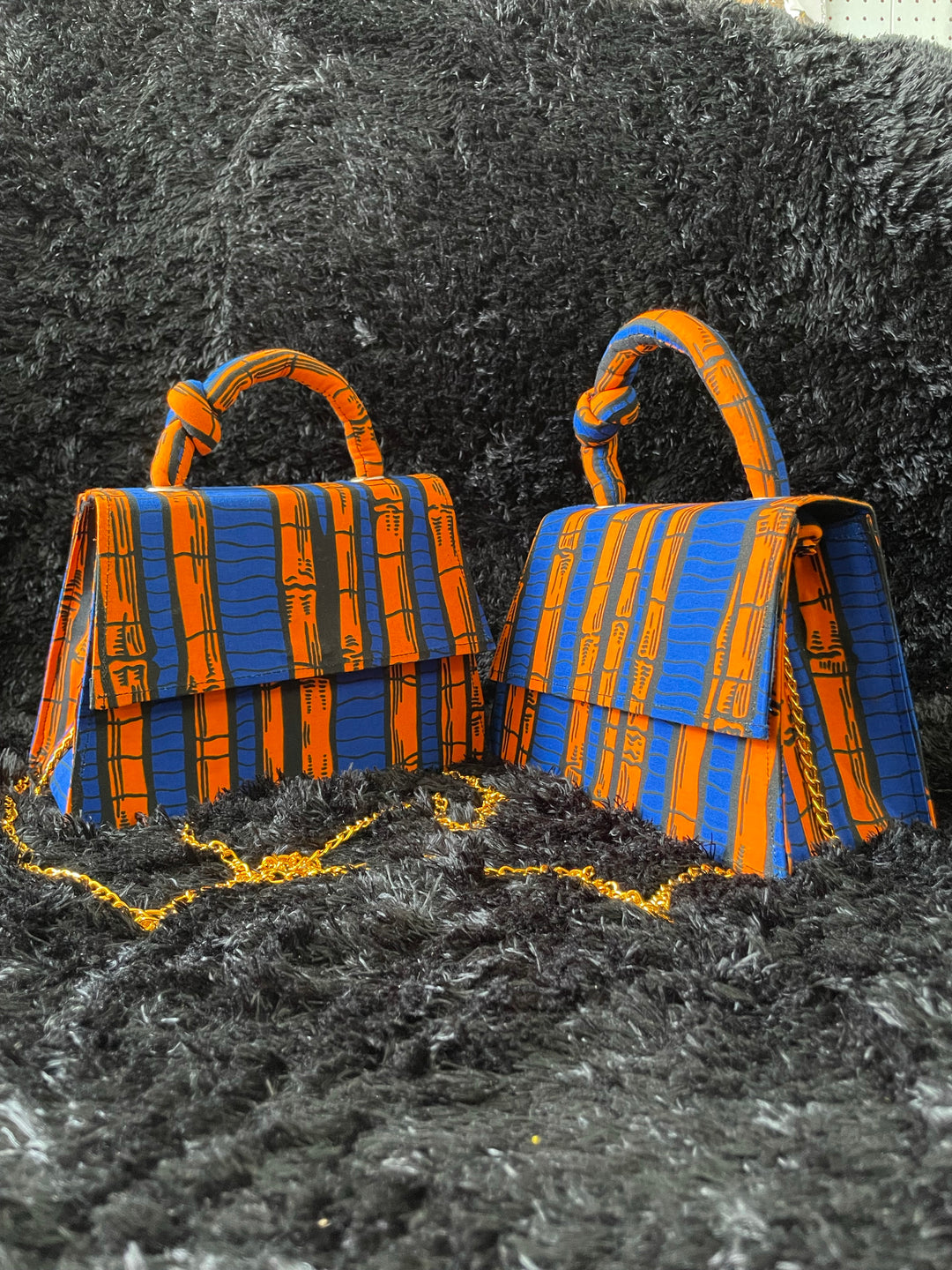 African print mini handbags.