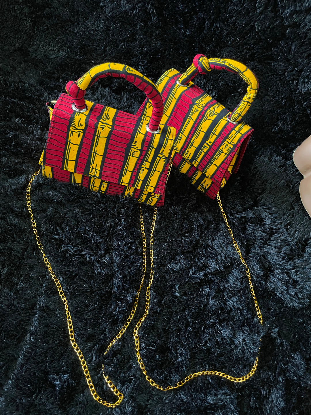 African print mini handbags.